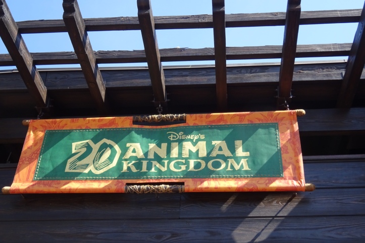 A green sign reading Disney's Animal Kingdom with a large number 20 to the left.